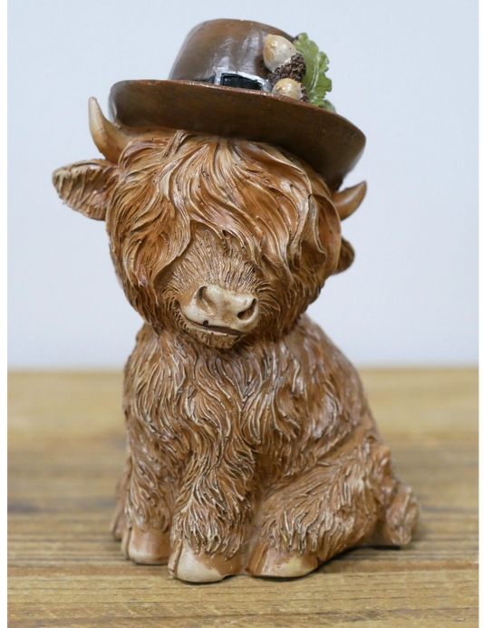 Highland Cow Sitting with Hat