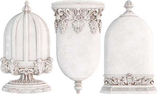 White castings of Iron Orchid Designs Les Cloches mould. Three intricately designed castings in white clay on a white background