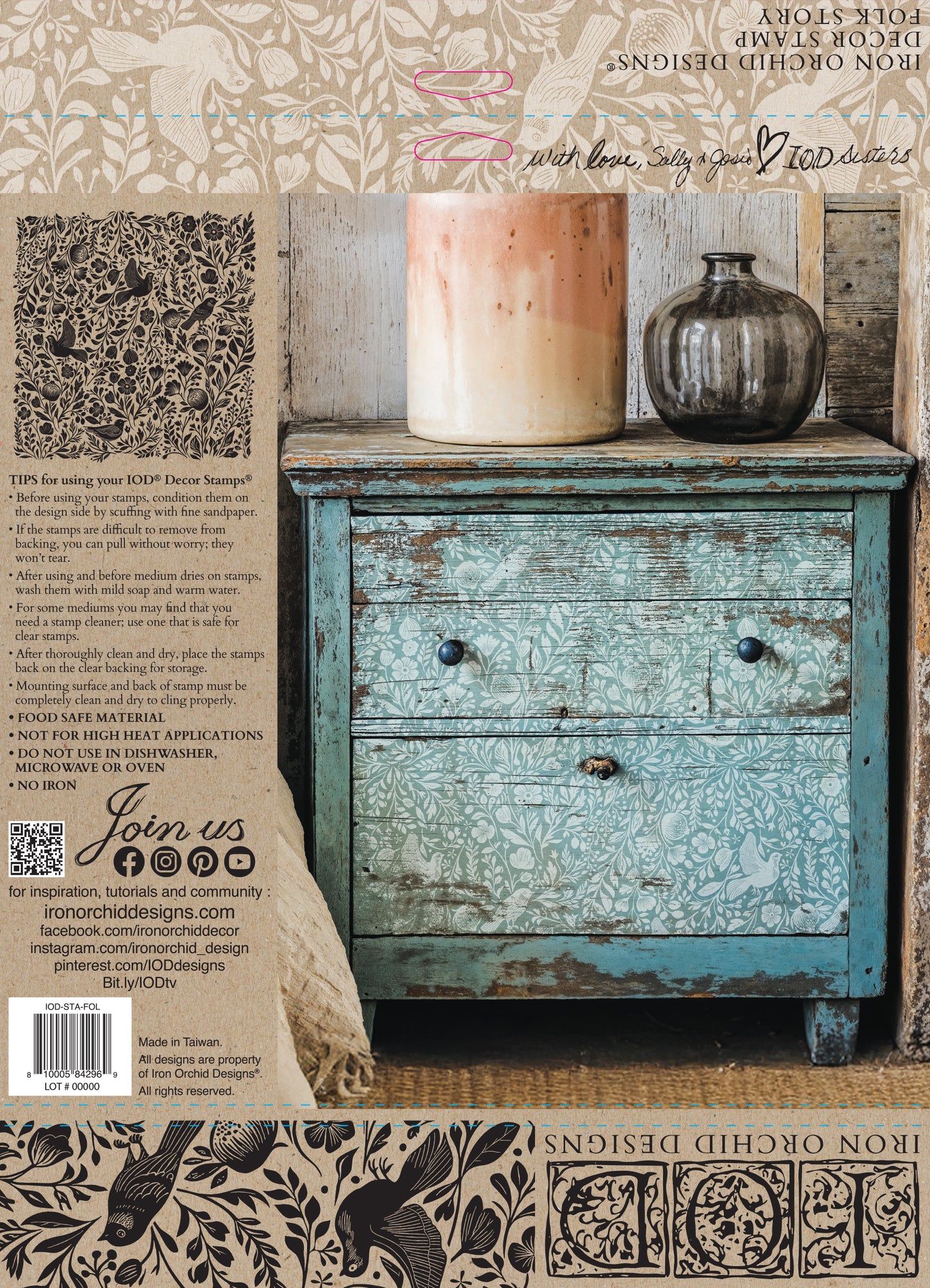 Decorative distressed dresser with candles and a vase, featuring Iron Orchid Designs products.