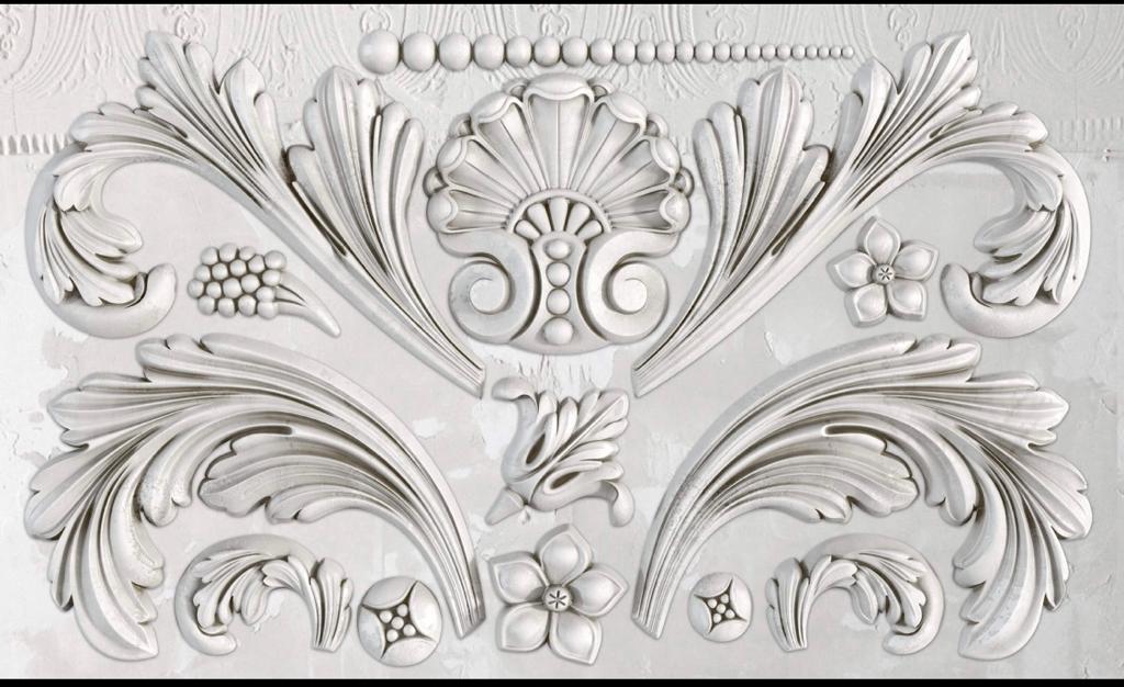 Iron Orchid Designs Acanthus Scroll white castings of the mould