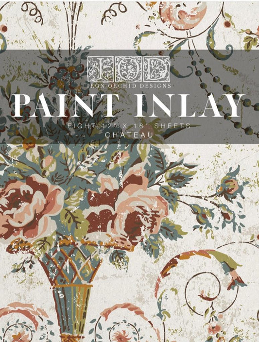 Iron Orchid designs Chateau Paint Inlay showing a vintage aged effect vase with a bouquet of faded flowers front of packet