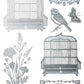 Decorative silver designs with birdcages, birds, and floral elements on a white background by Iron Orchid Designs