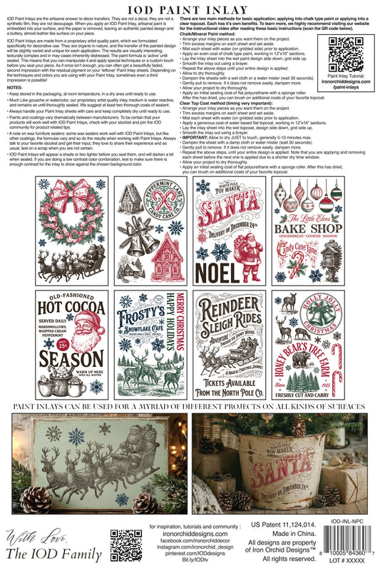 A product information sheet for IOD Paint Inlay featuring multiple holiday-themed stencil designs such as Santa, wreaths, hot cocoa, frosty cider, reindeer sleigh rides, and baker shop motifs, along with text instructions, a QR code, and a small example application photo.