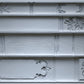 Decorative silicone Bookish mould from Iron Orchid designs with bookshelf design patterns on a grey background