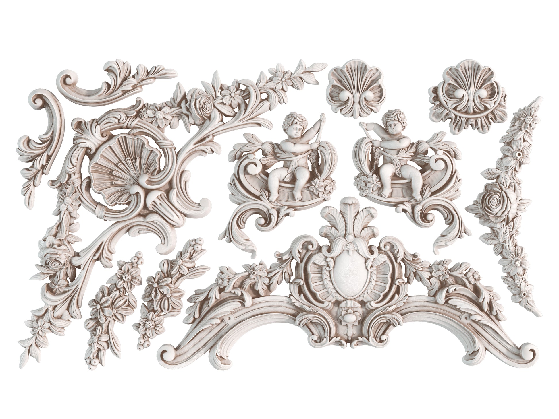 White clay castings of cherubs, swirls and decorative elements from Iron Orchid Designs Cadre Mould
