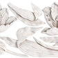 A close up of white castings from Iron Orchid Designs Tulips mould. White detailed florals and leaves on a white background
