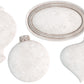 White clay castings of four Christmas baubles and a disc from Iron Orchid Designs Bibelots on a white background