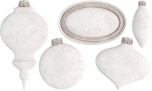 White clay castings of four Christmas baubles and a disc from Iron Orchid Designs Bibelots on a white background