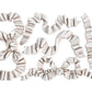 White castings on a white background of Iron Orchid Designs Bows mould