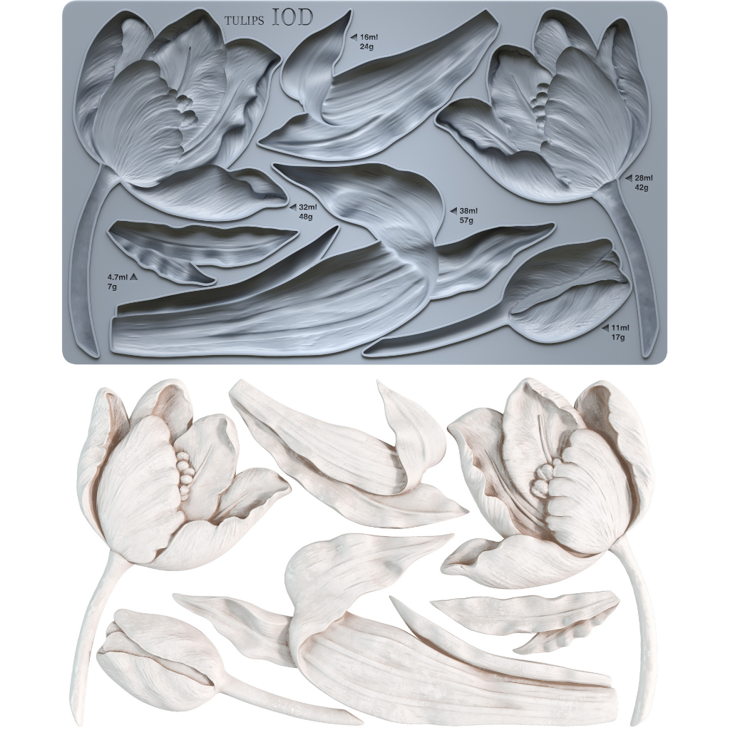 Grey silicone Tulips mould from Iron Orchid Designs above white castings from that mould. Both on a white background
