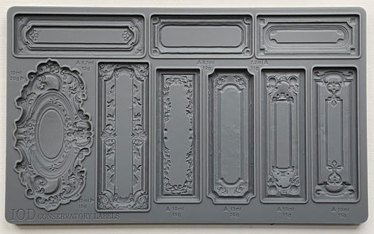A gray-colored decor mould by Iron Orchid Designs featuring nine different conservatory labels with detailed, ornate designs.
