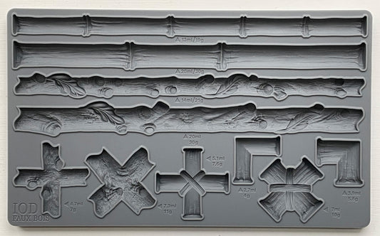 A grey silicone craft mould from Iron Orchid Designs featuring various bamboo and faux bois designs for furniture appliques and moulds.