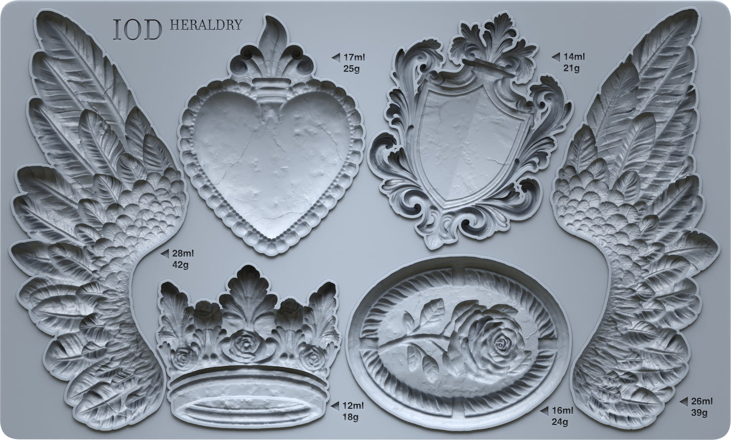 A grey silicone mould from Iron Orchid Designs featuring images from Heraldry. Wings, a crown, a shield and more