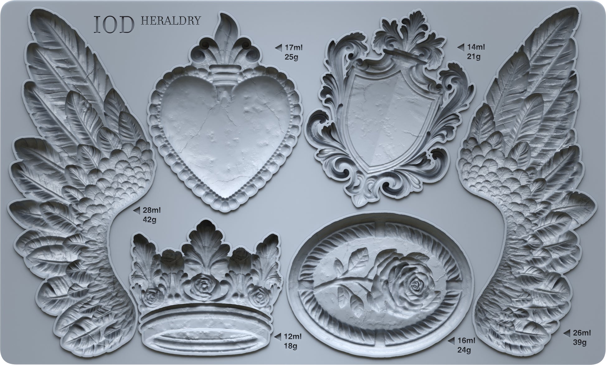 A grey silicone mould from Iron Orchid Designs featuring images from Heraldry. Wings, a crown, a shield and more
