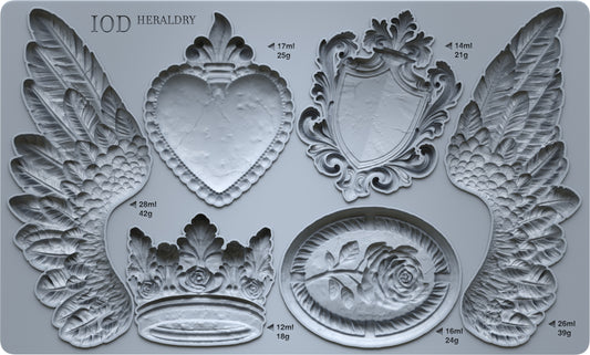 A grey silicone mould from Iron Orchid Designs featuring images from Heraldry. Wings, a crown, a shield and more