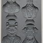 A set of four animal bust molds, including a cat, dog, stag, and fox, each wearing a hat and bow tie, from Iron Orchid Designs.
