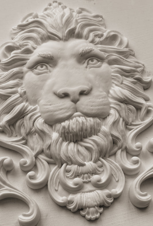 White clay casting of the lion's head from Iron Orchid Designs Leonidas mould.