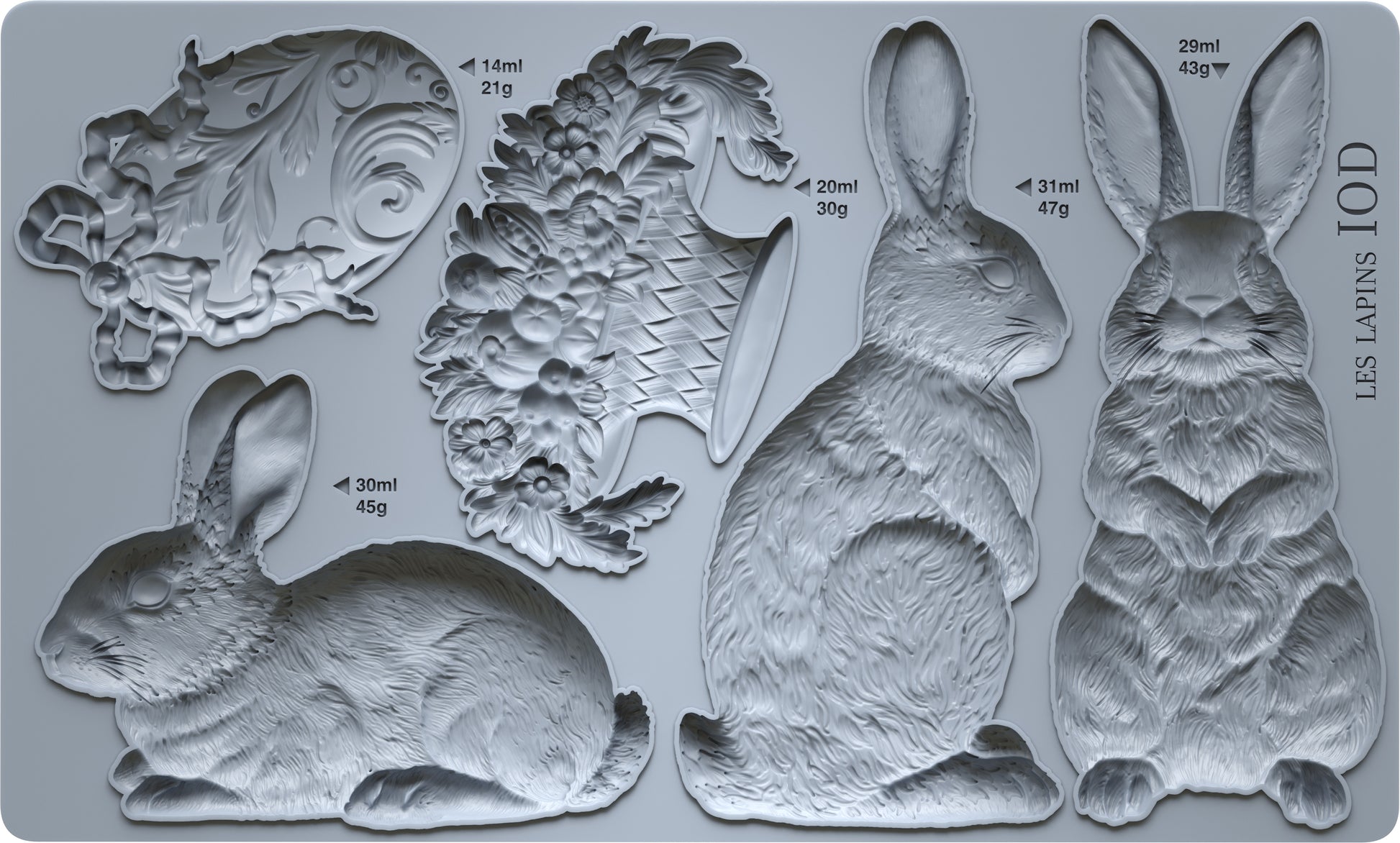 Grey silicone mould from Iron Orchid Designs. Les Lapins has three rabbits, a basket and an decorative egg.