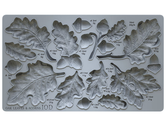 An Iron Orchid Designs grey silicone craft mould featuring various oak leaves and acorns designs.