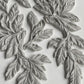 A close up image of white castings on a white background from Iron Orchid Designs Viridis mould