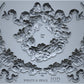 Decorative mould with wreath and swag designs on a grey background from Iron Orchid Designs