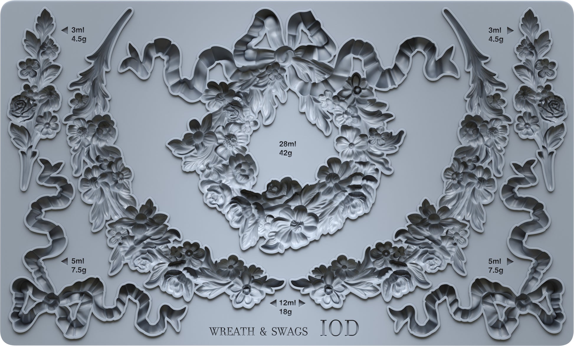 Decorative mould with wreath and swag designs on a grey background from Iron Orchid Designs
