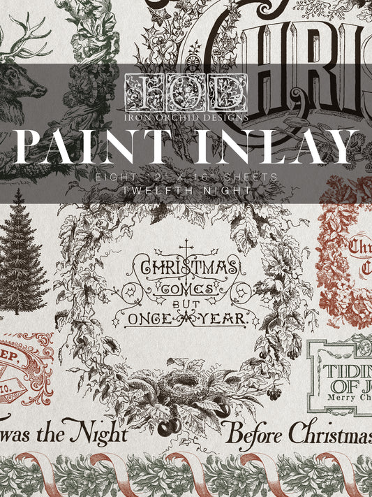 Decorative paper with Christmas-themed designs and text, featuring the brand 'Iron Orchid Designs'.