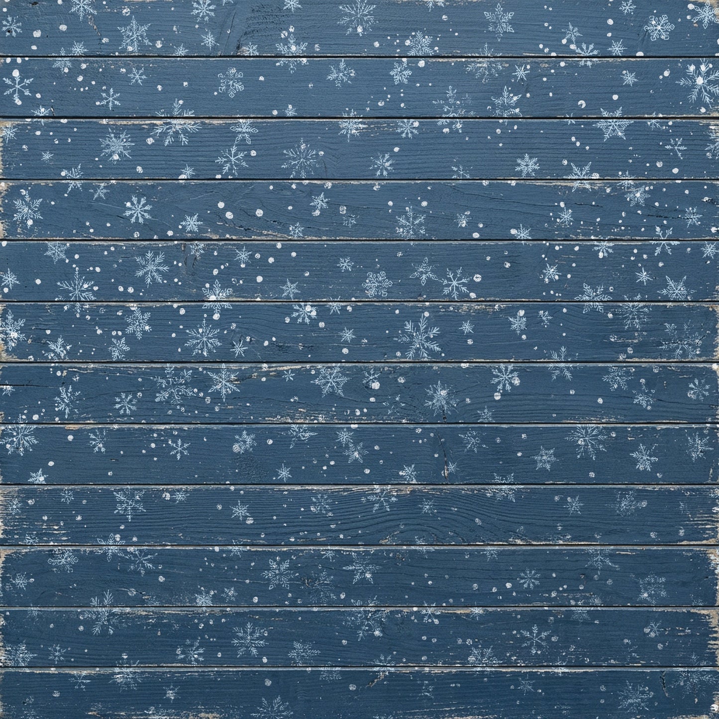 A square decorative panel featuring horizontal dark blue wooden planks with a distressed finish, decorated with hand-painted white snowflakes and snowflurries across the surface. Flurry stamp From Iron Orchid Designs.