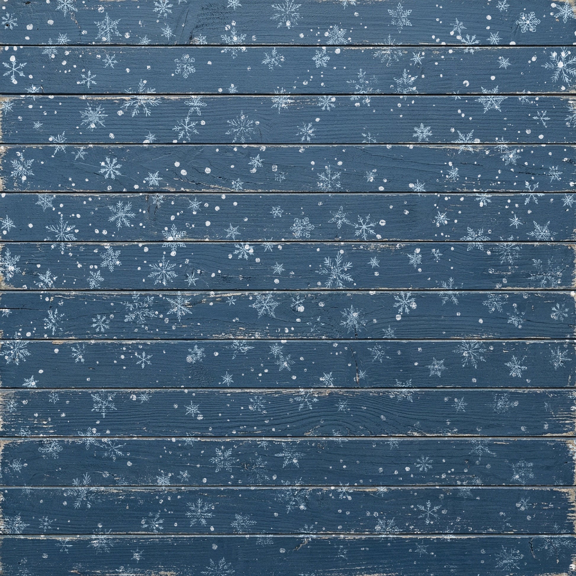 A square decorative panel featuring horizontal dark blue wooden planks with a distressed finish, decorated with hand-painted white snowflakes and snowflurries across the surface. Flurry stamp From Iron Orchid Designs.