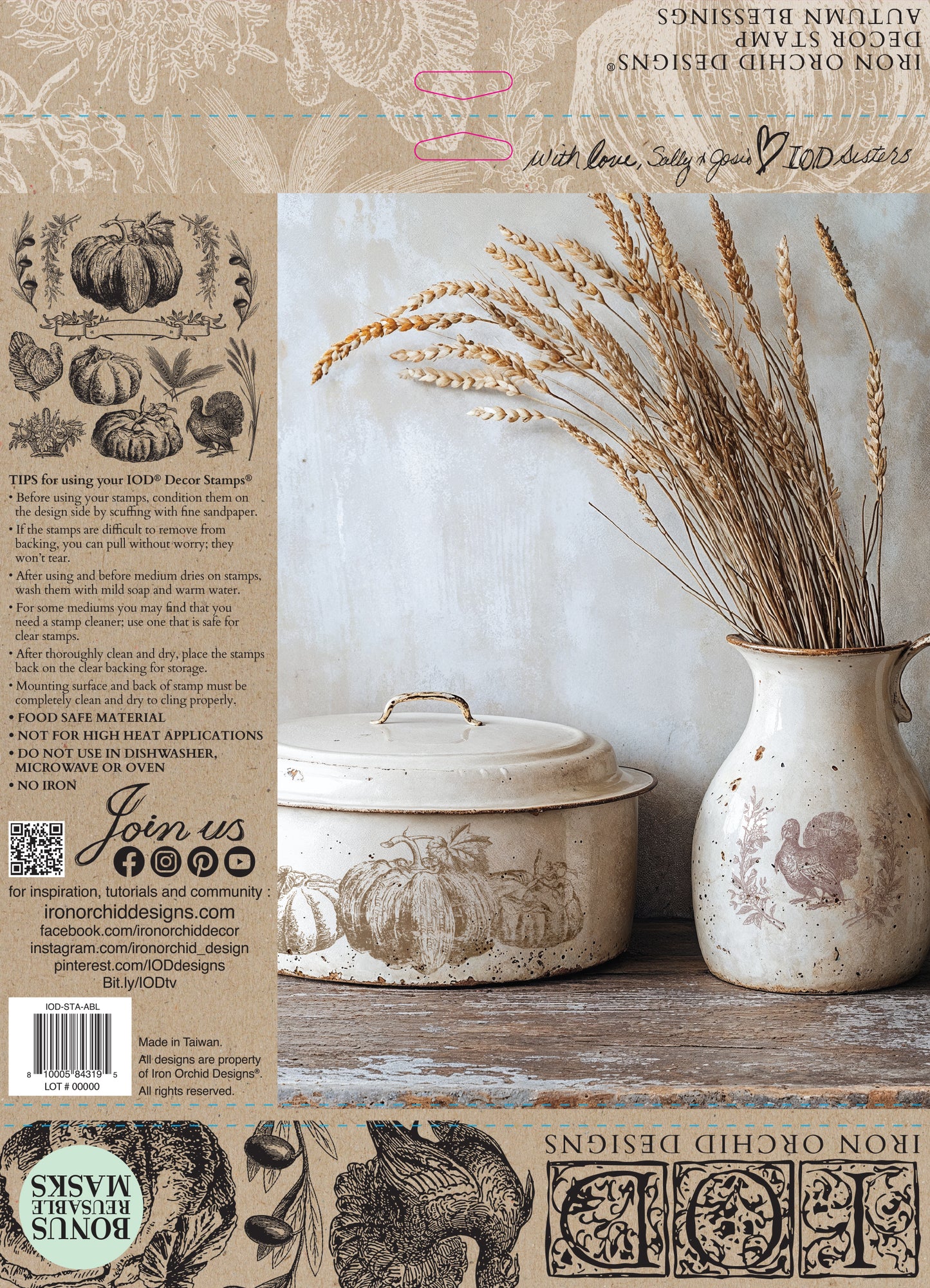 Packaging for Iron Orchid Designs Autumn Blessings Stamp showing decorative items including a ceramic jar and a vase with wheat on a wooden surface, with a rustic design theme.