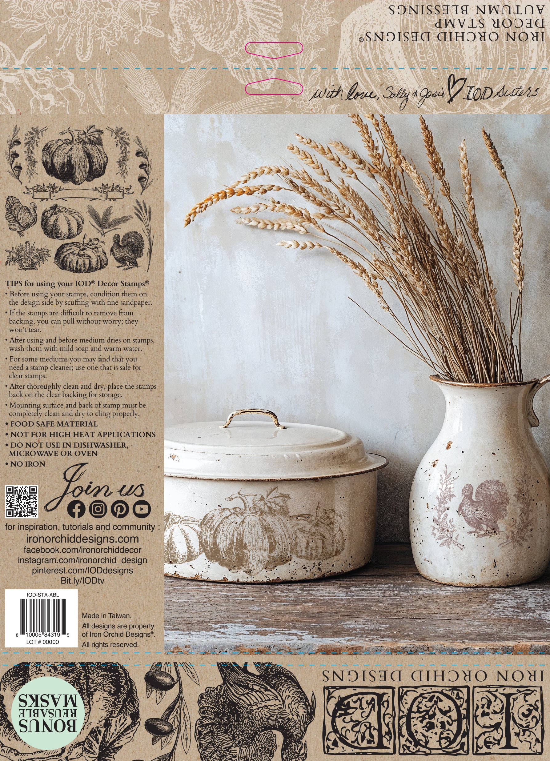 Packaging for Iron Orchid Designs Autumn Blessings Stamp showing decorative items including a ceramic jar and a vase with wheat on a wooden surface, with a rustic design theme.