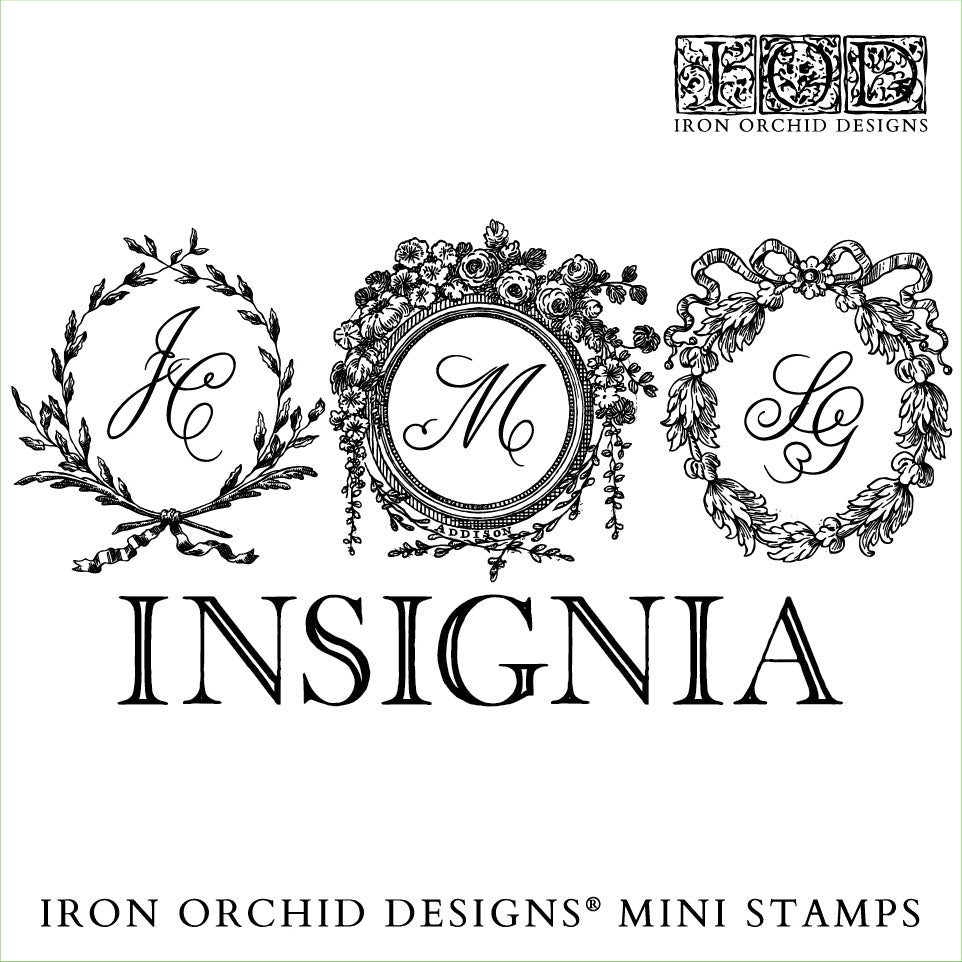 A collection of monogram stamp designs from Iron Orchid Designs' Insignia Mini Stamp Set, featuring floral wreath designs and initials.