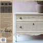 Decorative dresser stamped with Iron Orchid Designs Lace and text on a white background