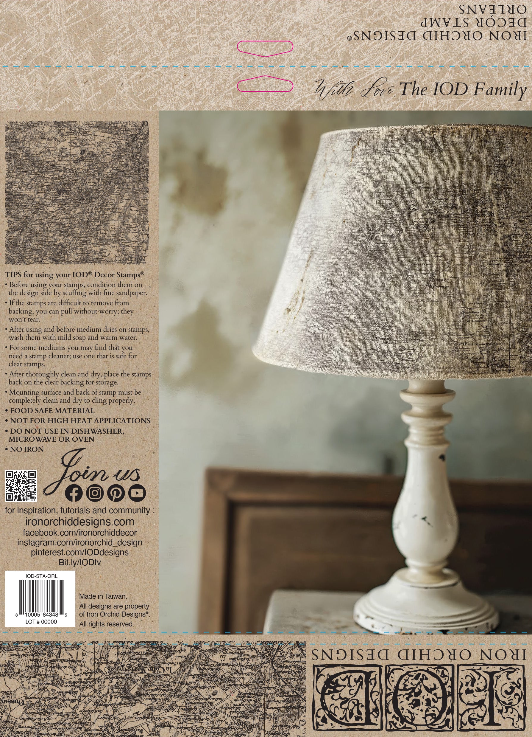 Lamp with textured shade on a wooden surface, surrounded by text and branding elements from the Orleans stamp by Iron Orchid Designs