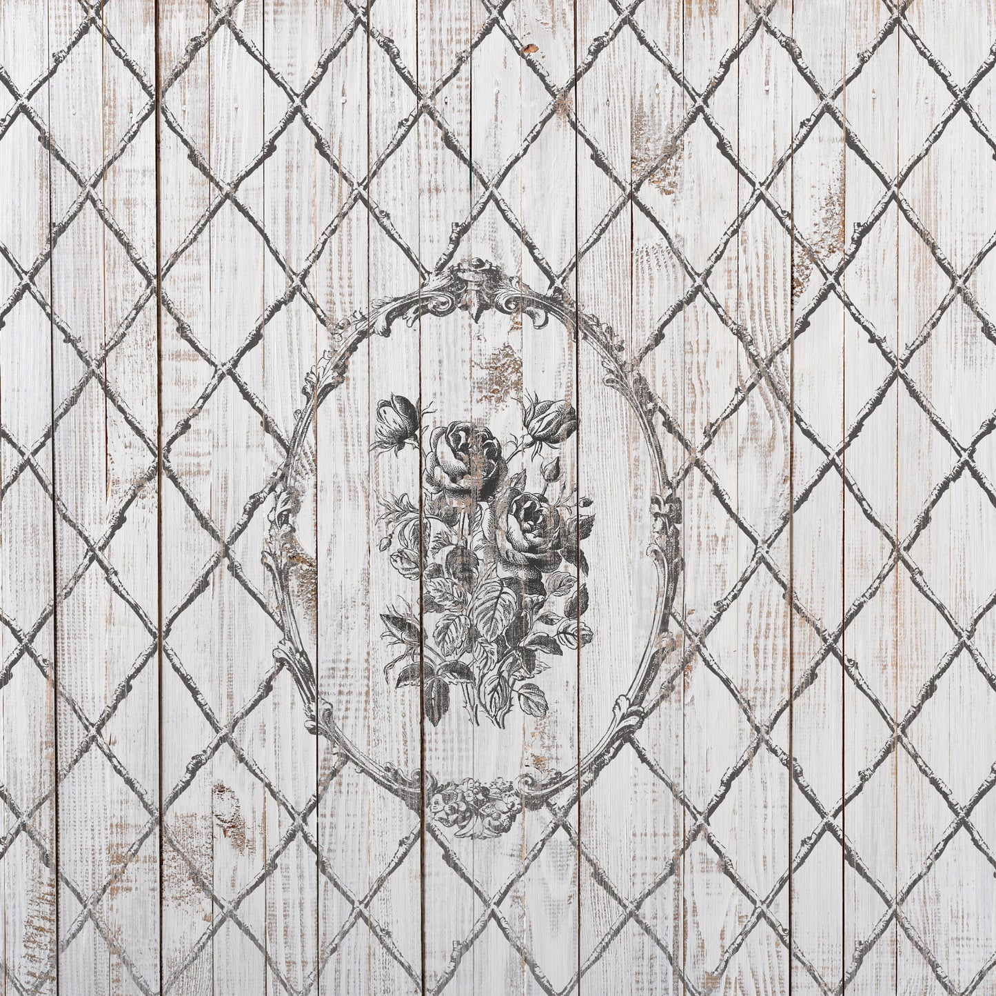A vintage picture created using Iron Orchid Designs Veranda stamp. There is a flower filled oval frame surrounded by latticework. The image is printed using grey ink on a planked background