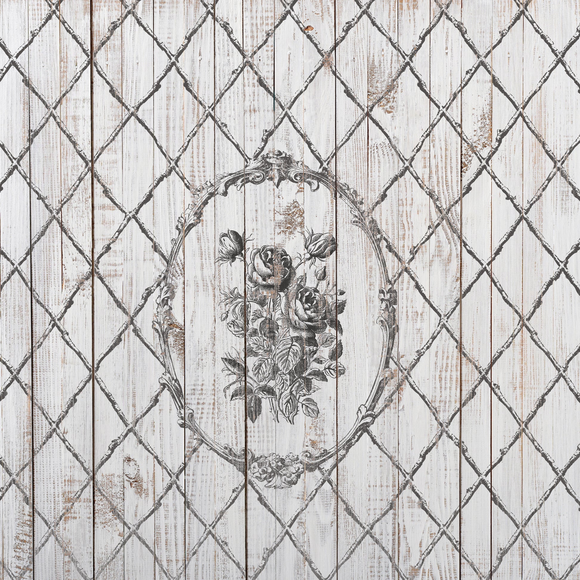 A vintage picture created using Iron Orchid Designs Veranda stamp. There is a flower filled oval frame surrounded by latticework. The image is printed using grey ink on a planked background