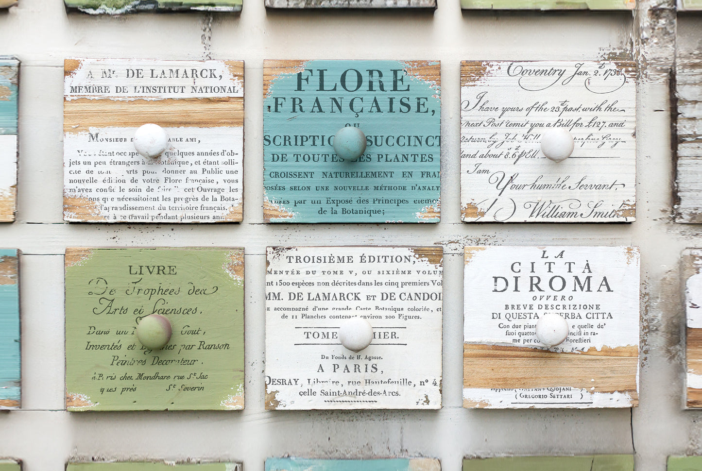 Multi coloured drawers fronts stamped with Iron Orchid Designs Ephemeral Type Stamp