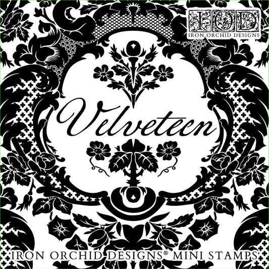 A graphic image of a damask pattern stamp with the word 'Velveteen' written across the center, indicating the name of the stamp set from Iron Orchid Designs.