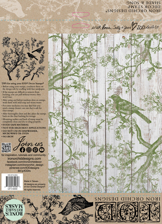 A cardboard packet with instructions on how to use IOD stamps alongside a green on white image of the Shade and Song Stamp