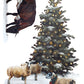A whimsical winter illustration featuring a snow-covered evergreen tree with warm lights, several sheep in the snow, and a dark horse hanging from a snowy wall on the left, all on a white background. From Iron Orchid Designs.