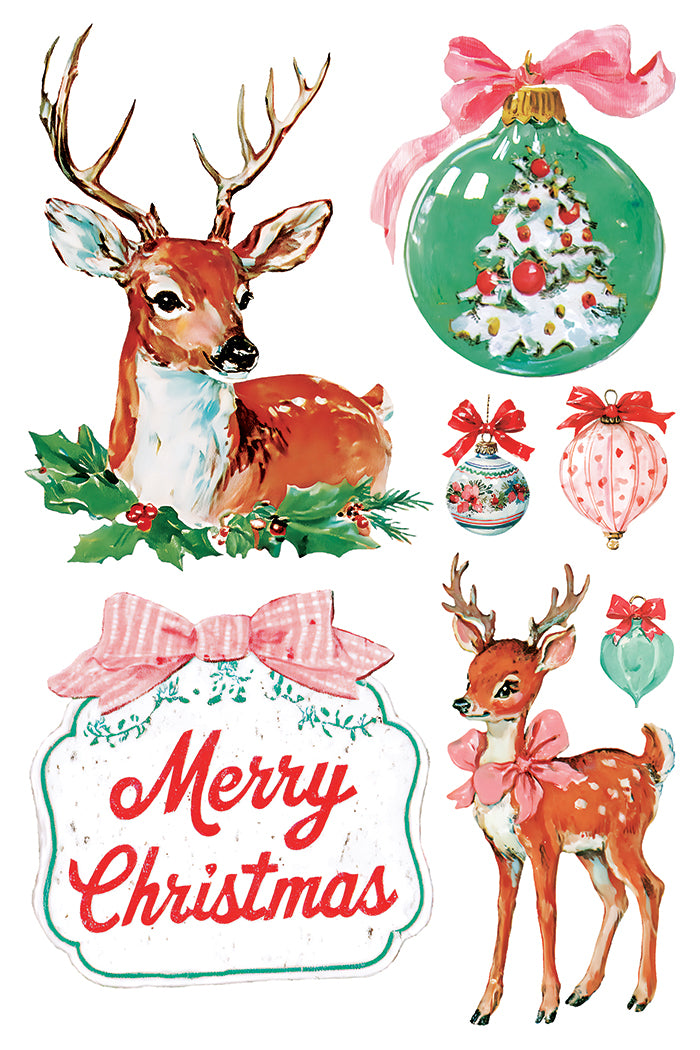 A festive Christmas watercolor illustration sheet featuring a deer with antlers, a green ornament with a decorated tree inside, smaller ornaments, a pink bow, and a 'Merry Christmas' sign on a white background. From Iron Orchid Designs.