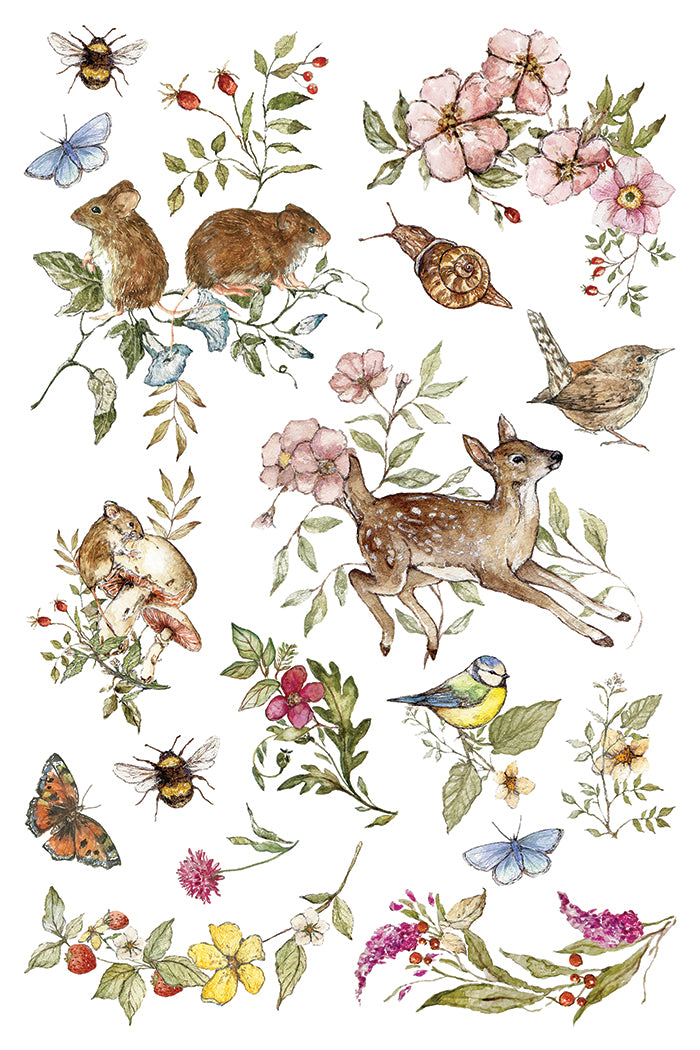 A sheet of watercolor-style nature illustrations on a white background, including a deer, birds, butterflies, bees, flowers, leaves, and small animals. From Iron Orchid Designs