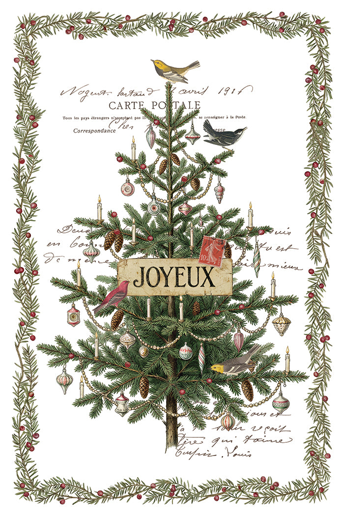 A vintage-style Christmas art print featuring a decorated evergreen tree with ornaments, birds, handwritten script, and a central 'JOYEUX' label, surrounded by a wreath border on a white background. From Iron Orchid Designs