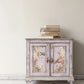 Vintage-style cabinet with floral designs on a white wall from Iron Orchid Designs Flowers By The Poets transfer