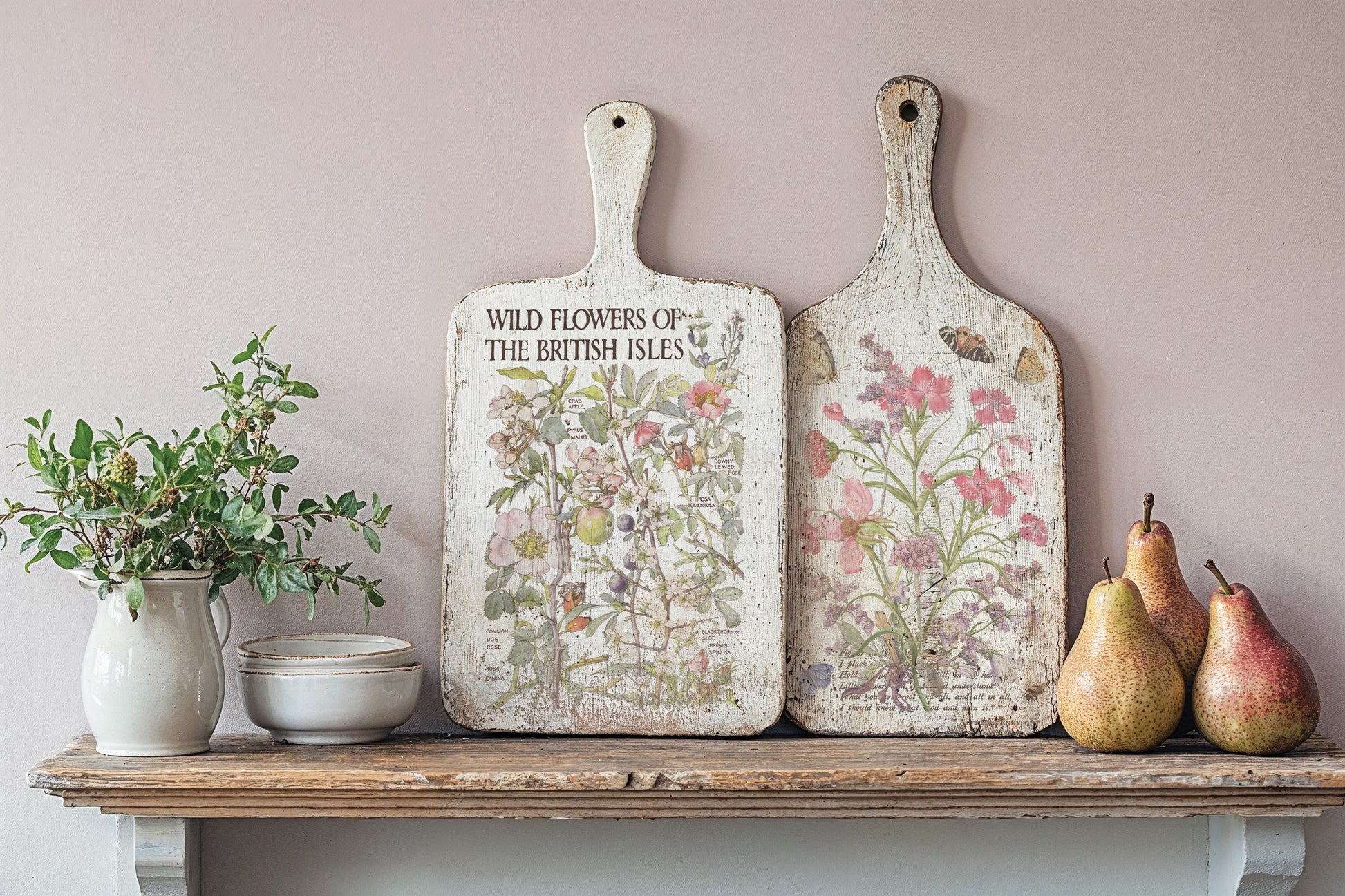 Decorative cutting boards with floral designs on a shelf against a light pink  wall from Iron Orchid Designs Primrose Isle Transfer