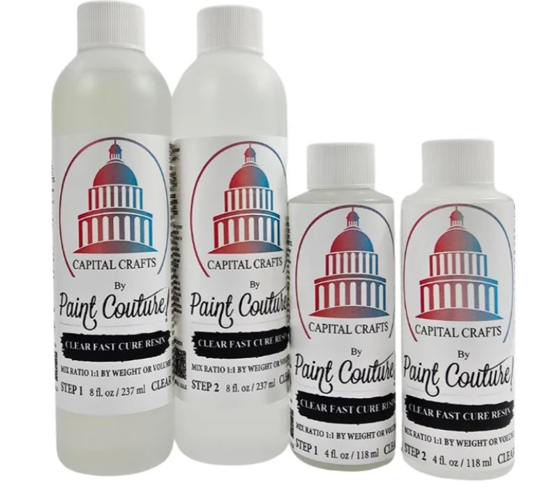 Four bottles of Capital Crafts by Paint Couture Clear Fast Cure Resin arranged in ascending sizes against a plain white background.