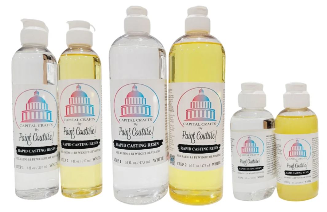 Six bottles of Capital Crafts Paint Couture Rapid Casting Resin in various sizes, showing both clear resin and yellow resin liquids with white caps on a white background.