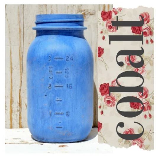 Blue mason jar with floral and text background