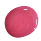 Blob of deep pink paint on a white background