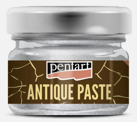 A jar of Pentart Silver Antique Paste, featuring a brown label with gold crackle lines and the brand name 'pentart' in white, topped with a brushed silver metal lid.